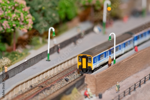 miniature model commuter train in a station