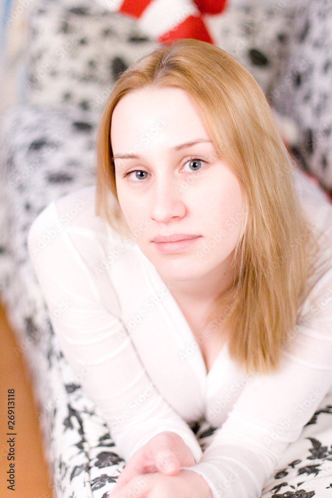 woman laying on the sofa woman laying on the sofa