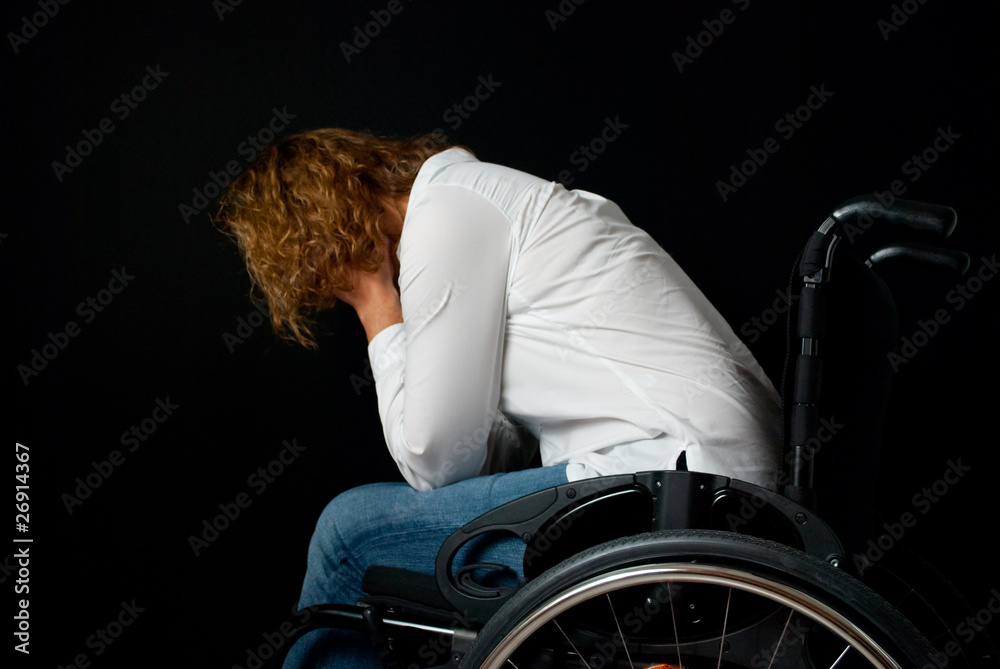 Obraz premium Frau im Rollstuhl