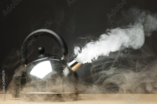 boiling kettle with dense steam