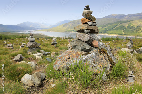 cairns overlooking loch highlands of scotland © simon gurney