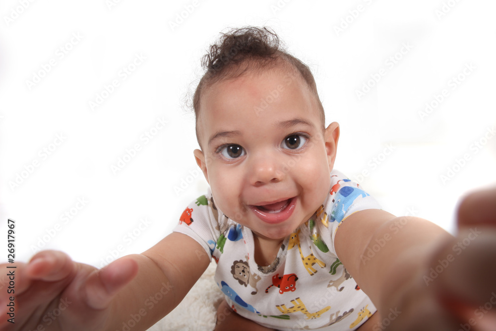Baby boy reaching towards the viewer Baby boy reaching towards the viewer