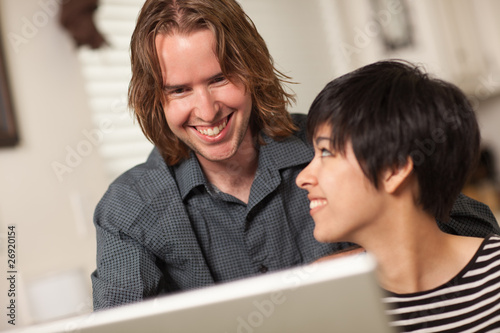 Happy Young Man and Woman U...