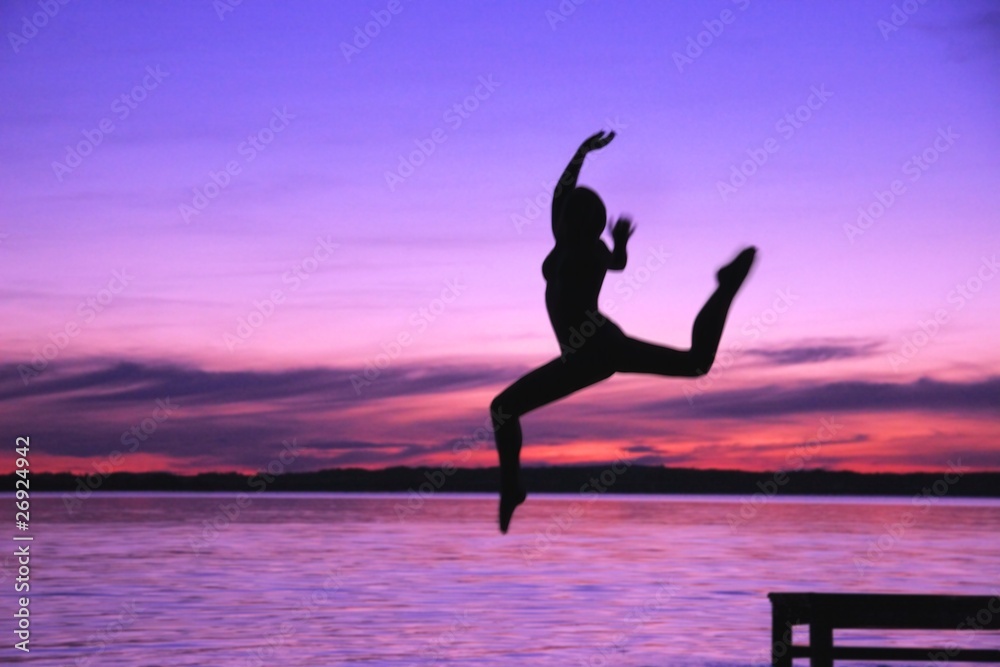 Woman Leaps Into The Water