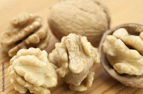 Walnuts on wooden surface