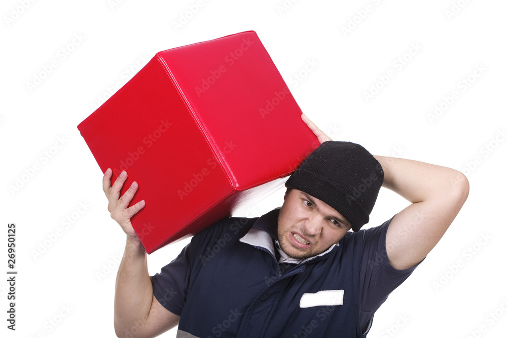 man carrying red cube man carrying red cube