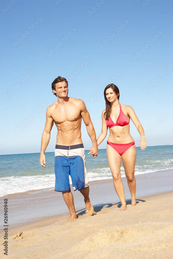 Young Couple Enjoying Beach Holiday