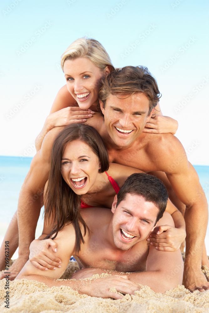 Group Of Friends Enjoying Beach Holiday Group Of Friends Enjoying Beach Holiday