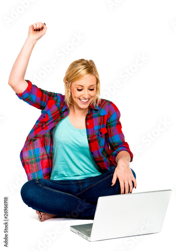 Celebrating Success with Laptop