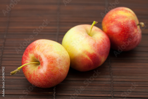 Apples on a bamboo mat