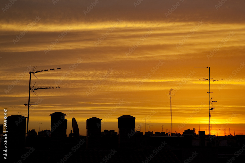 Sun Rising over Rooftops in Madrid, Spain Sun Rising over Rooftops in Madrid, Spain