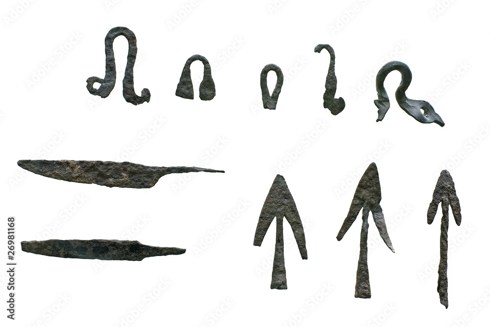 bronze spear and arrow heads with hooks isolated on white