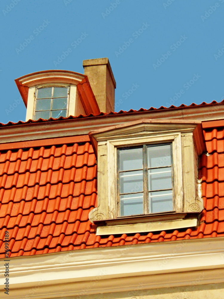 Red tile roof, dormers and chimney Red tile roof, dormers and chimney