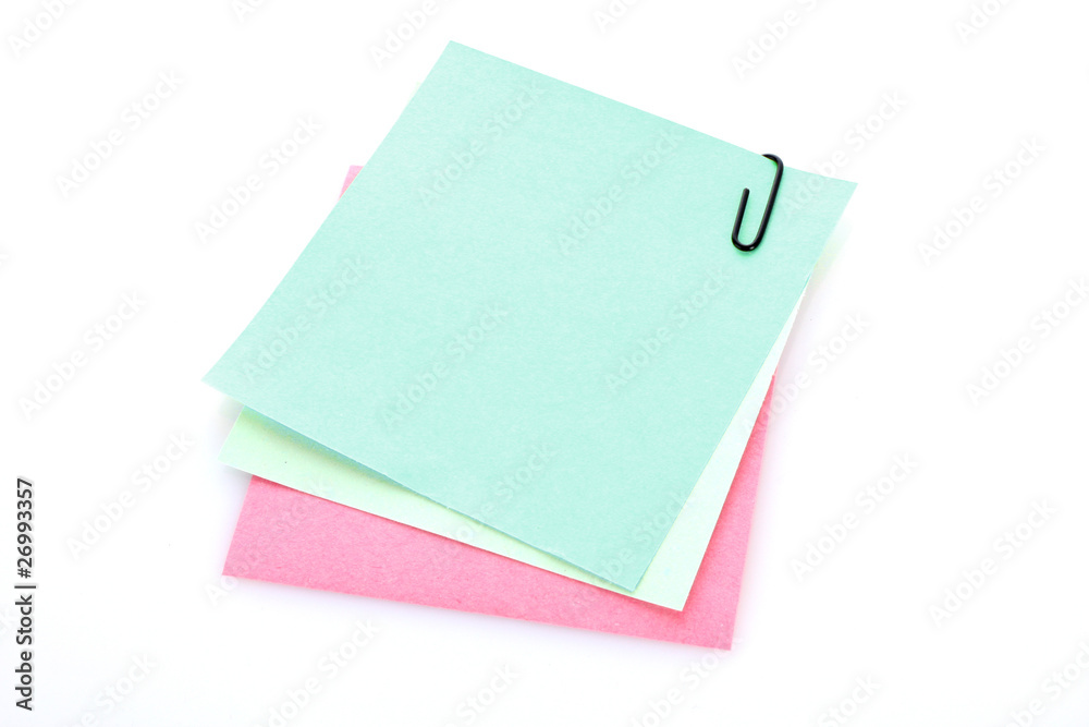 Three reminder notes with clip isolated on white Three reminder notes with clip isolated on white