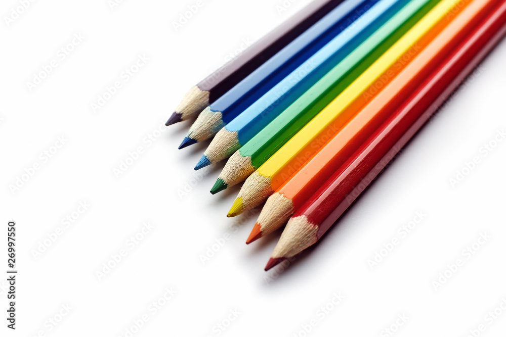 Fototapeta premium Colored pencils arranged in rainbow spectrum order