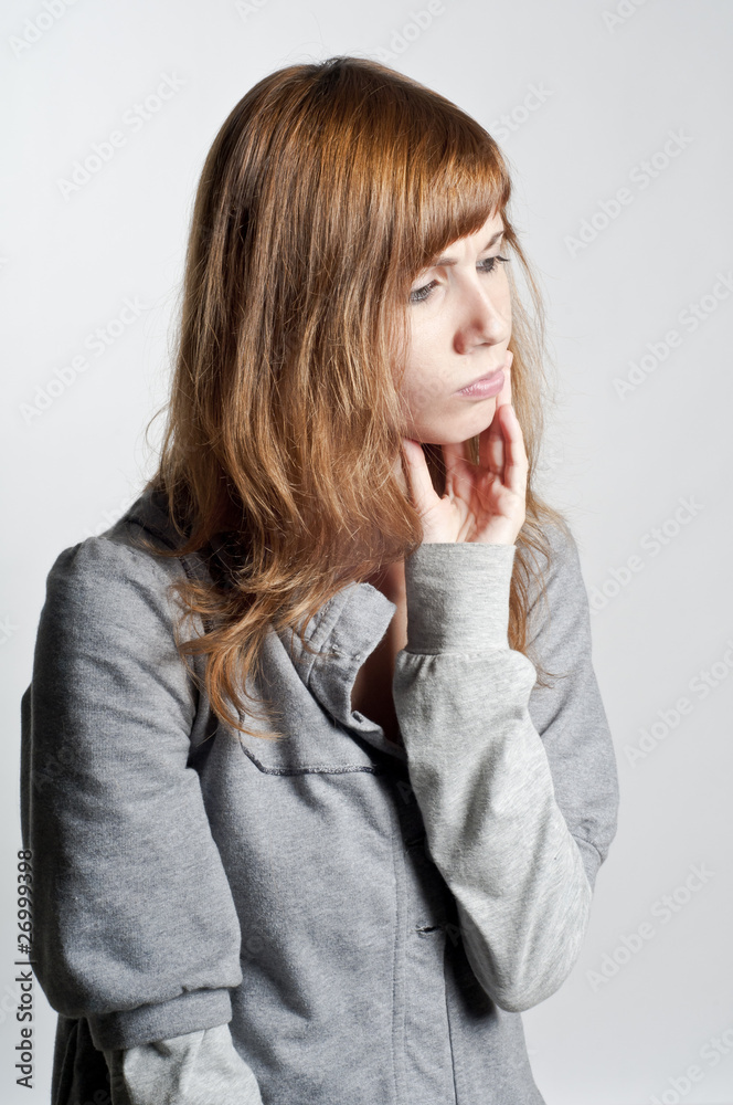 portrait of blonde girl who thinks