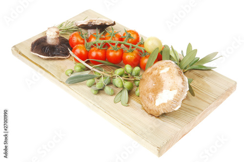 vegetables served on wooden board