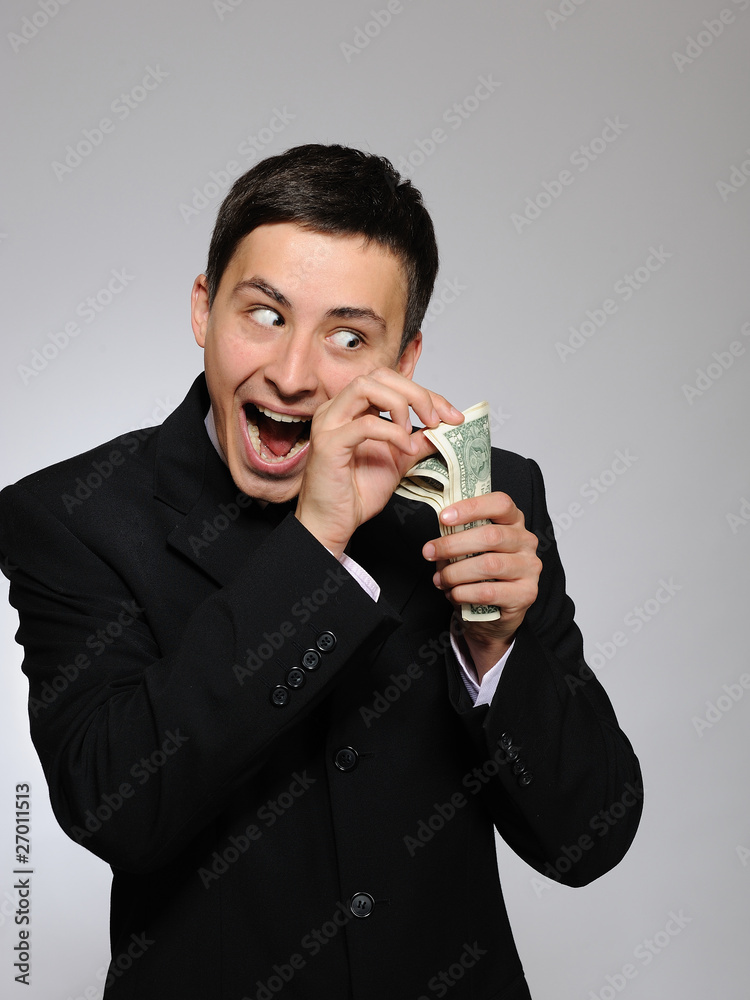Expressions - Young handsome business man in black suit and tie Expressions - Young handsome business man in black suit and tie
