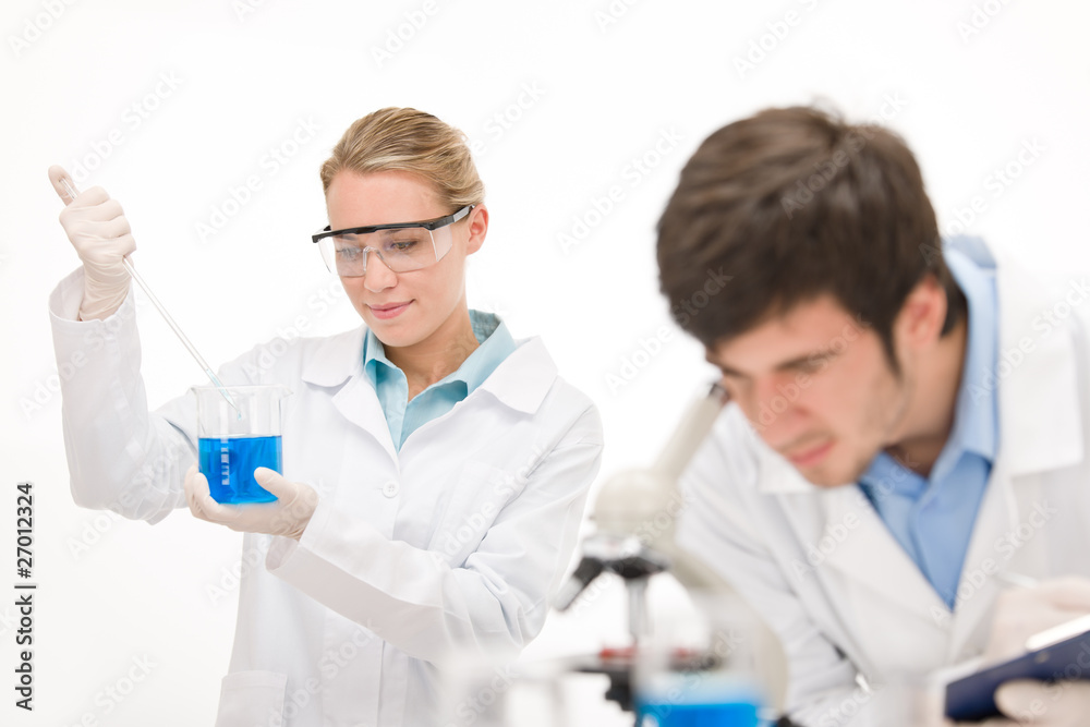 Flu virus experiment - scientist in laboratory Flu virus experiment - scientist in laboratory