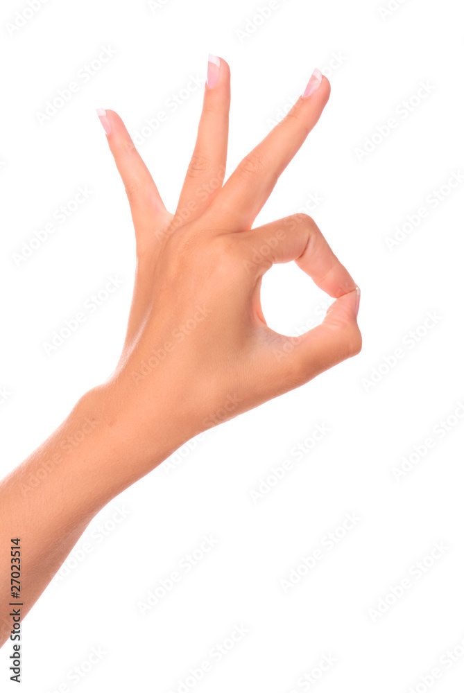 Woman's hand making sign Ok isolated on white background Woman's hand making sign Ok isolated on white background
