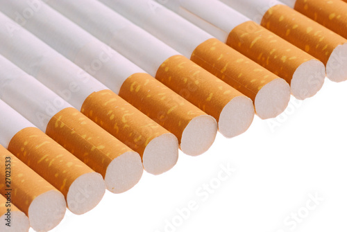 Bunch of filter-tipped cigarettes in a row