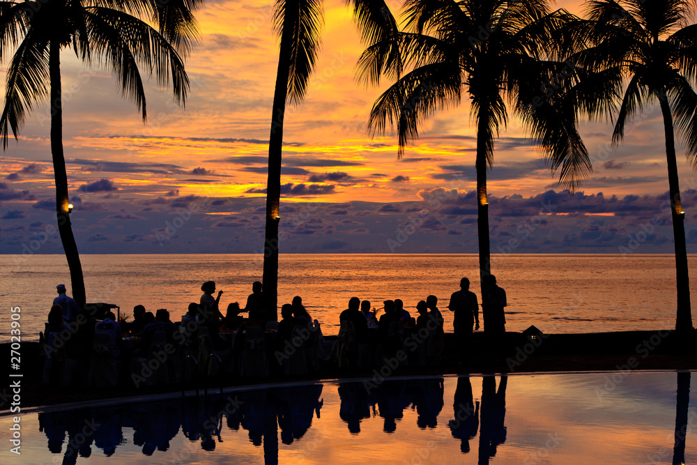 Fototapeta premium Diner on the beach at sunset