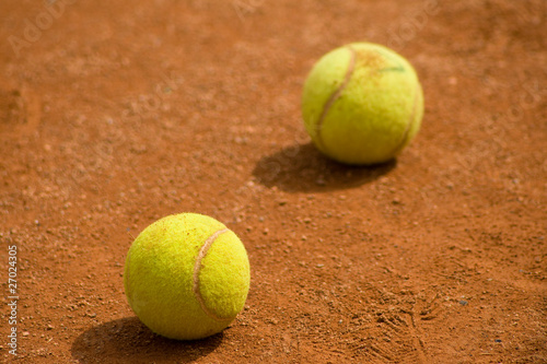 Tennis ball on court © Yordan Rusev