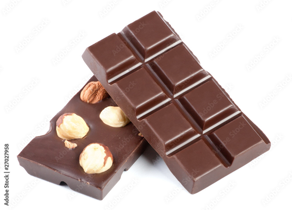 Pieces of chocolate bar with nuts isolated on white Pieces of chocolate bar with nuts isolated on white