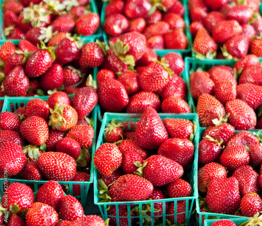 Baskets of Fresh Strawberries in a Market Baskets of Fresh Strawberries in a Market