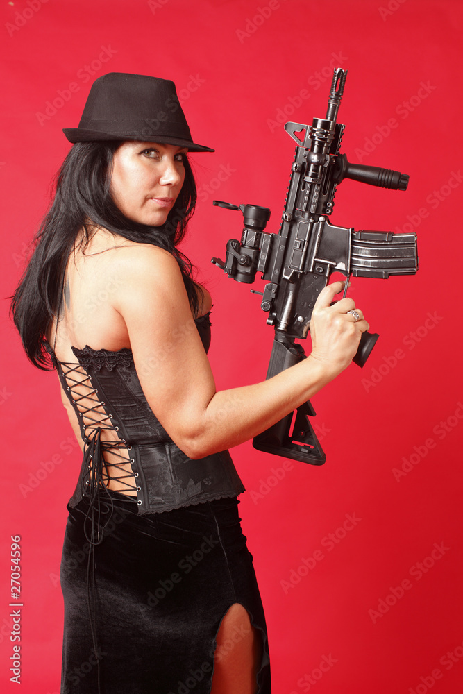 Sexy woman with an assault gun.