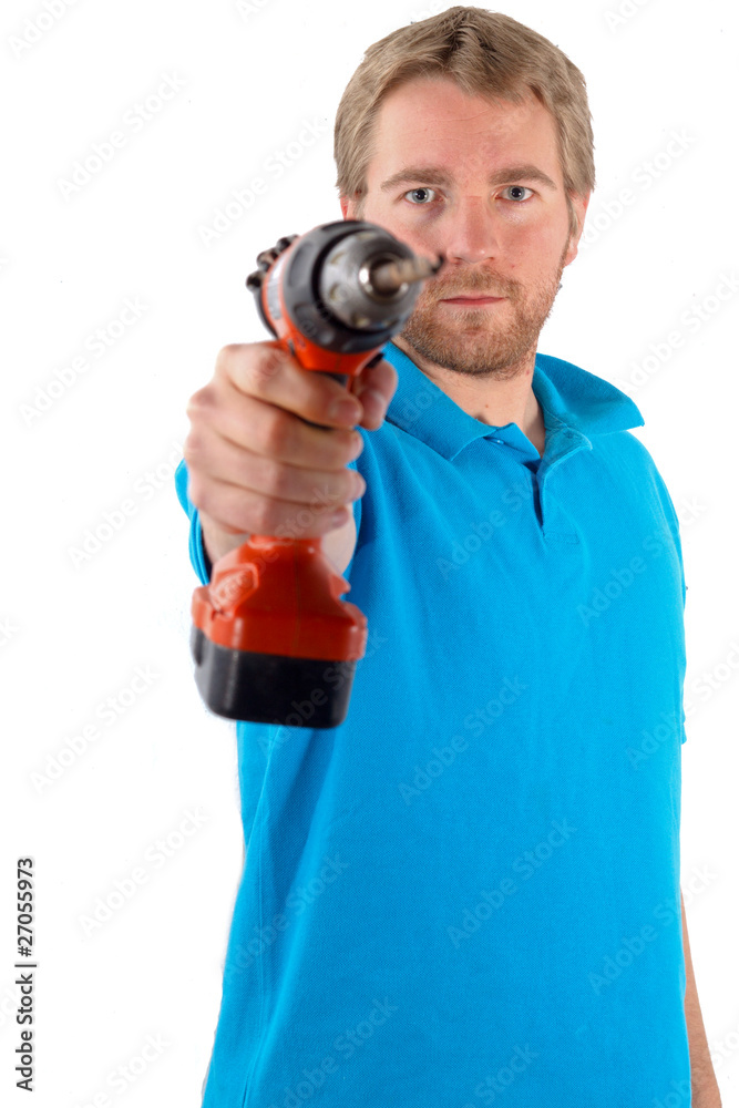 Homme pointant une perceuse Homme pointant une perceuse