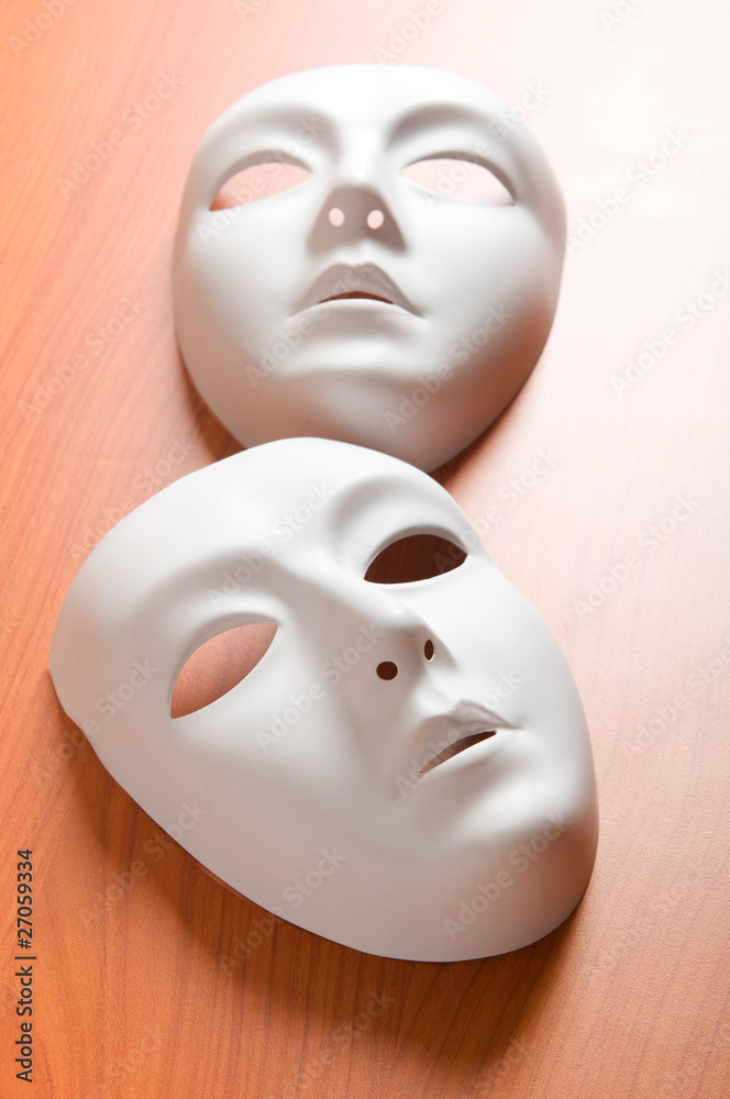 Theatre concept with the white plastic masks Theatre concept with the white plastic masks