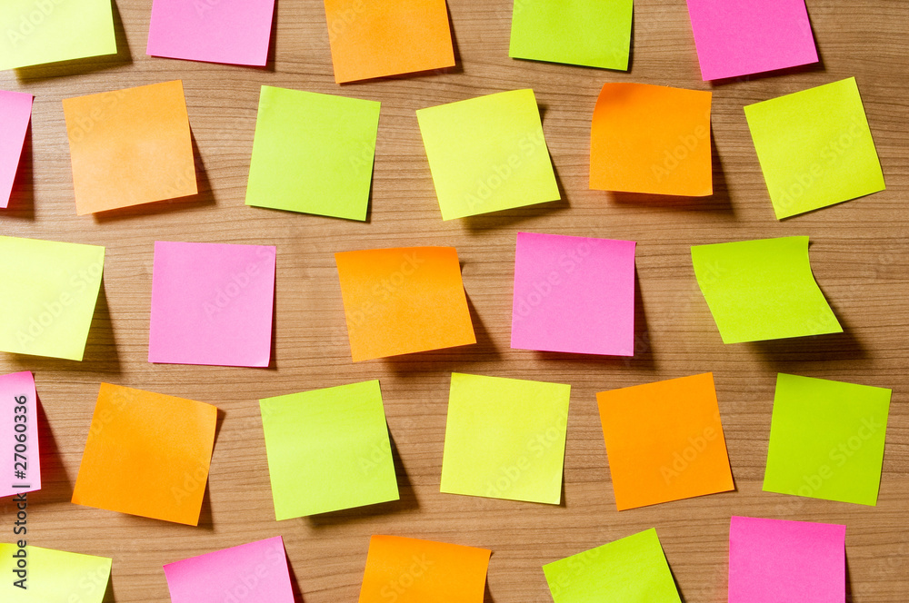 Many reminder notes on the wooden background Many reminder notes on the wooden background