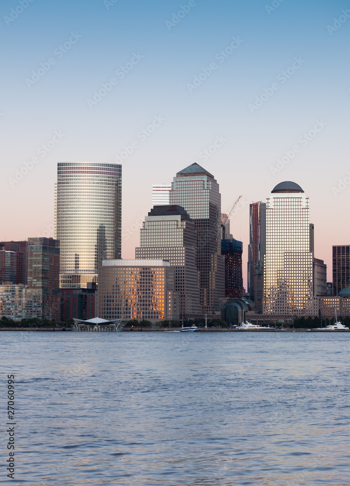 Fototapeta premium Manhattan Financial District at sunset panorama from Jersey city