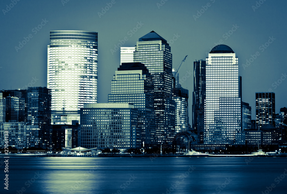 Fototapeta premium Manhattan Financial District at sunset panorama from Jersey city
