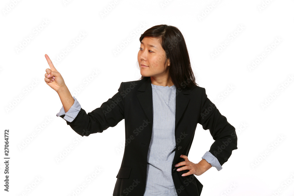 Woman pointing over white background with copy space Woman pointing over white background with copy space