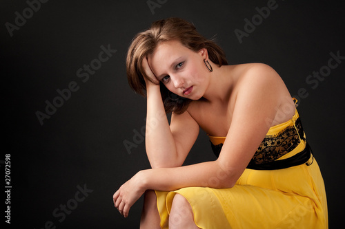 young woman looking depressed photo