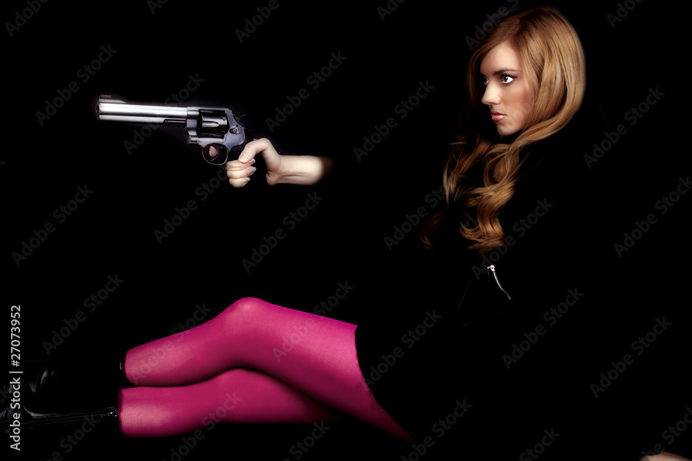 woman gun pink sit sideways