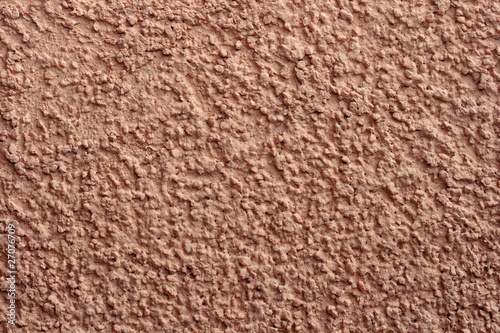 Red colored plaster wall background