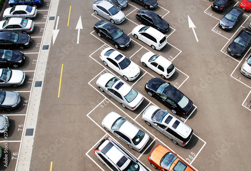 Aerial of a parking house full of cars