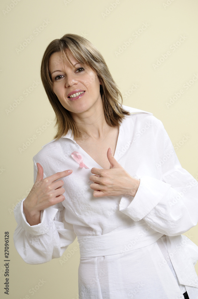 project manager showing pink symbol for cancer project manager showing pink symbol for cancer
