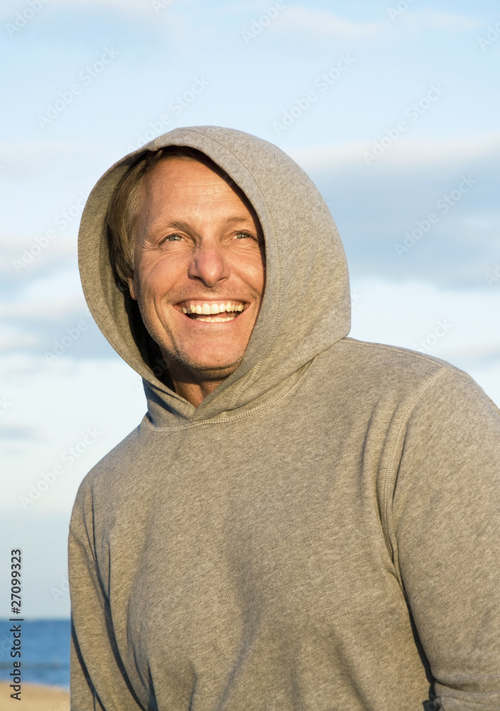 happy laughing man in his forties