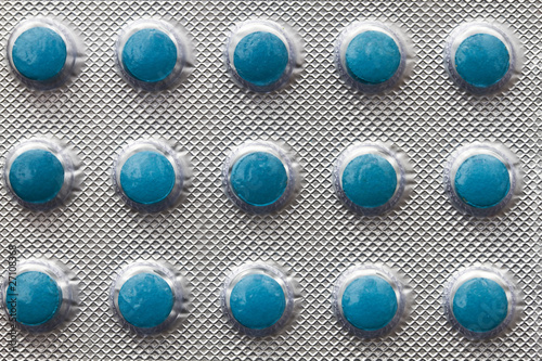 Blister pack with blue pills, close-up