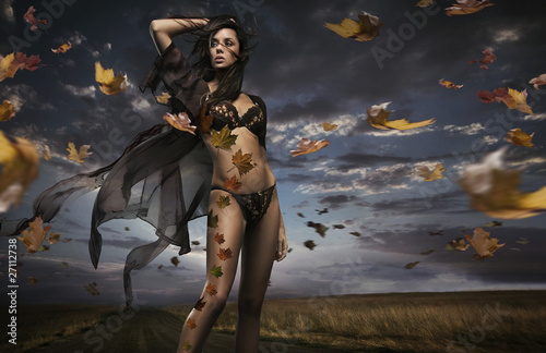 Fine art photo of a beauty lady in the autumn scenery photo