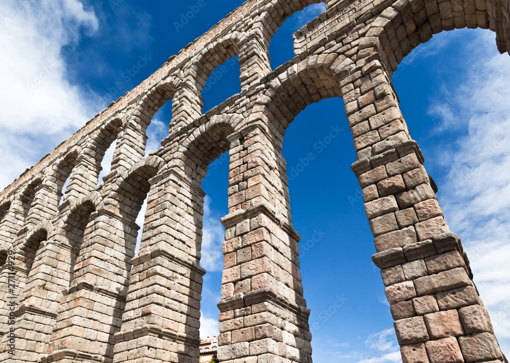The ancient aqueduct in Segovia The ancient aqueduct in Segovia