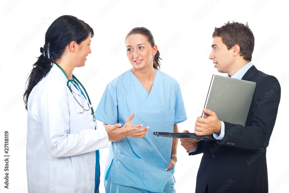 Executive man with laptop converse with doctors