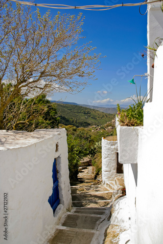 Greek island village alley photo