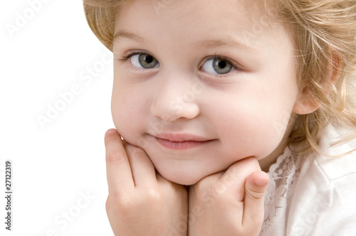 Adorable little girl close-up on white background