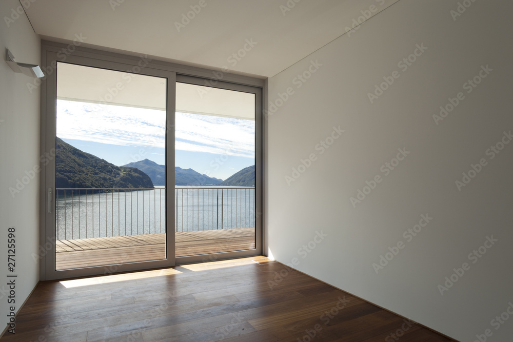 Fototapeta premium Small empty room, beautifull view on the lake