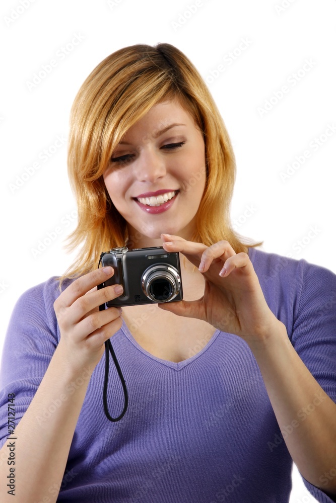 young woman with a camera (white background - focus on camera) young woman with a camera (white background - focus on camera)